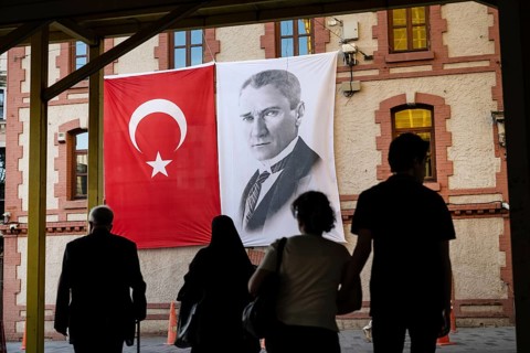 Istanbul, Turkey. May 26th 2026. The Turkish flag displayed beside a portrait of Mustafa Kemal