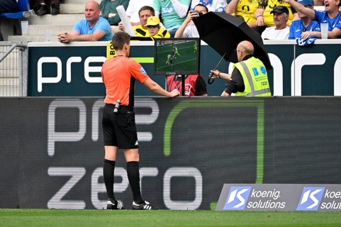 Referee Daniel Siebert in the review zone VAR, video assistant, video evidence, video referee video