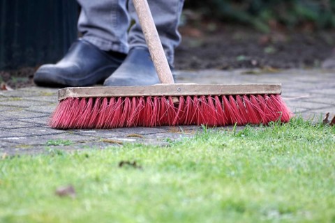 Broom, brush, sidewalk, cleaning, a man sweeps the paving stones in the garden
