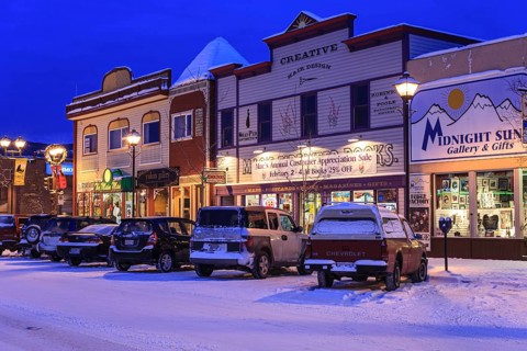 Historic buildings, houses, city, cars, shops, shopping, twilight, blue hour, illuminated, winter,