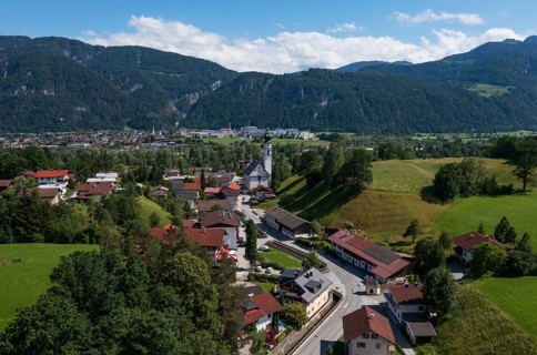 Drone image, view of village with parish church, Breitenbach am Inn, Inntal, Tyrol, Austria