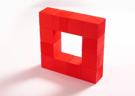 12 red wooden cubes against a white background