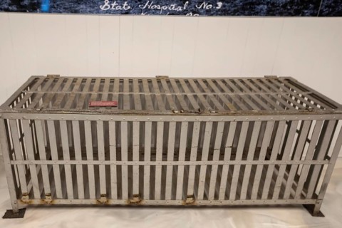 St. Joseph, Missouri - A restraint cage used to confine dangerous patients, on display at the Glore