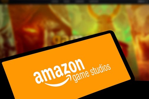 amazon game studios logo is displayed on smartphone. Amazon Games is an American video game company