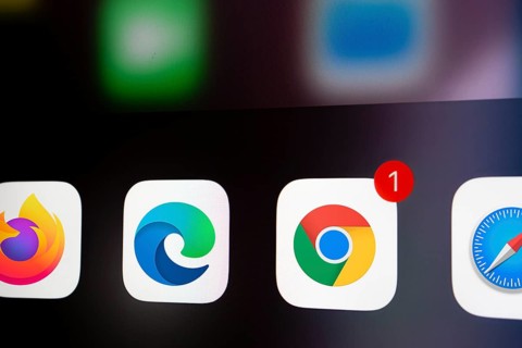 A close up of an iPhone screen displaying the Google Chrome, mozilla firefox, microsoft edge,