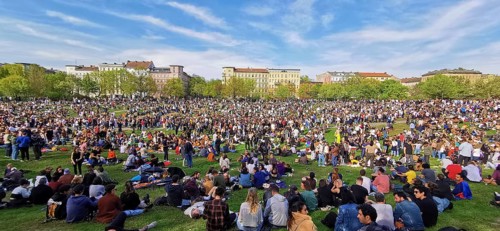 May 1, public holiday, Labor Day in Görlitzer Park in Berlin, many people sitting relaxing on the