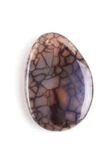 Colored onyx pendant isolated on white background, close up