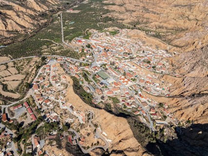 Canyons and gorges near village Gorafe, winding road, aerial view, Gorafe Desert, UNESCO Granada