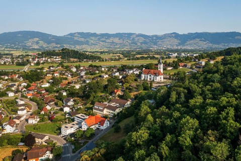 Drone image, view of town with parish church, Koblach, Rhine Valley, Vorarlberg, Austria