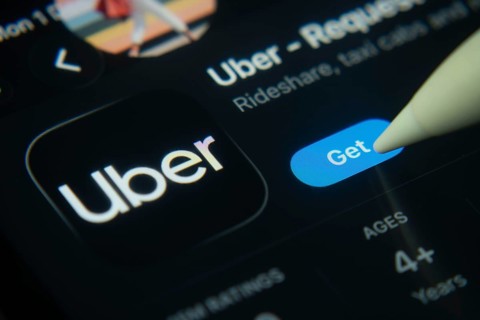 Dhaka, Bangladesh- 01 Dec 2025: A close-up of the Uber app icon in the App Store on an iPad screen