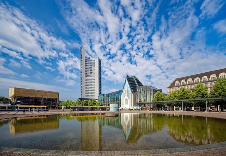 Morning atmosphere, Leipzig Augustusplatz with Gewandhaus, Mendebrunnen, city skyscraper and
