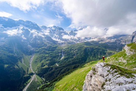Mountaineers in front of picturesque mountain scenery at the summit of Tanzbödeli, mountain