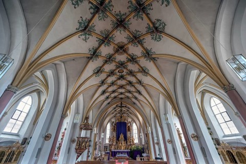 Interior with Gothic mesh vault and high altar, Holy Trinity parish church, founded in 1364,