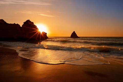 Beach and rocky coast at sunrise, Praia Dona Ana, Lagos, Algarve, Portugal