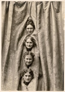 Dancers, cabaret, variety show, humor, curtain, Wheaton, Illinois, USA, four female heads peeking