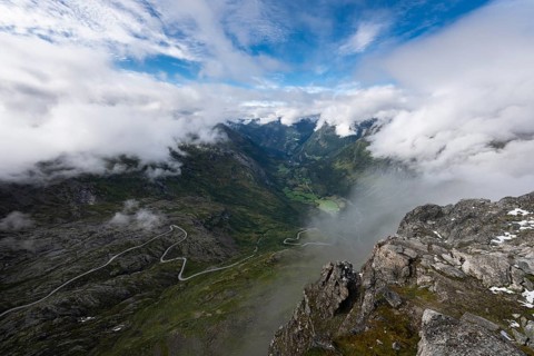 Famous curvy mountain road Fylkesvei 63 or Geirangervegen, which leads from Geiranger to the