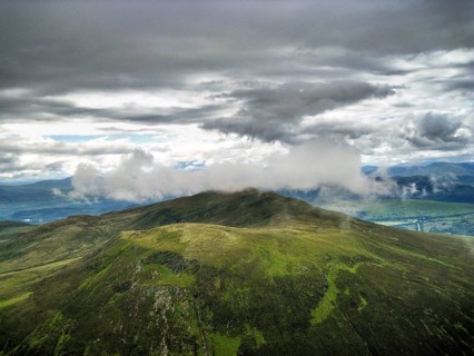 View from Ben Wyvis, mountain peak, Scottish Munro, hiking, dramatic cloudy sky, Easter Ross and