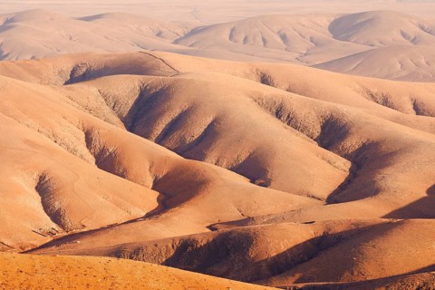 View of the barren and eroded landscape from the Mirador Morro Velosa viewpoint, Fuerteventura,