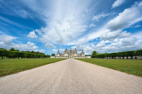 Southeast view of the monumental Renaissance Château de Chambord castle with its distinctive,