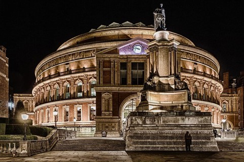 Statue of Prince Albert outside the Royal Albert Hall illuminated at night, Kensington, London,