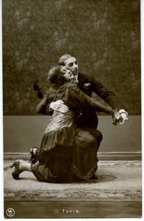 Tango, dance pose, twenties, tango-dancing couple in a heartfelt, kneeling hug on a sepia picture,