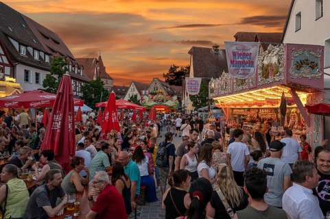 Visitor and candy stand at the Laufer City Festival, evening sky, Lauf an der Pegnitz, Middle