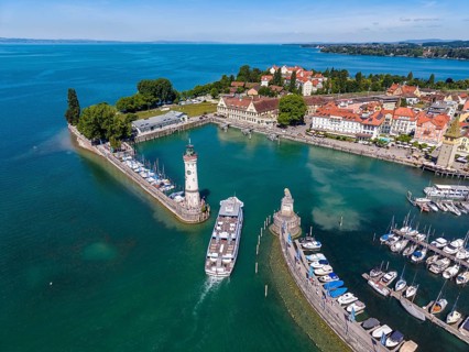 Aerial view of the island of Lindau in Lake Constance with the lighthouse, the Bavarian lions and