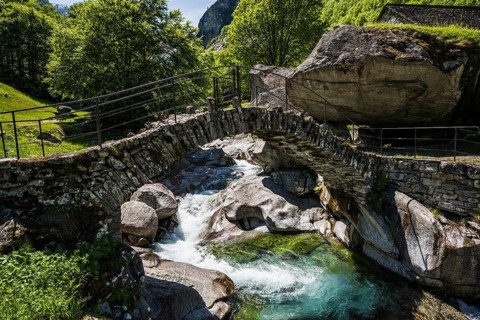 Traditional old stone houses and old stone arch bridge, Splueia Bella, near Foroglio, Val Calnègia,