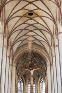 Rose petal rain from the Heiliggeistloch in the Abbey Basilica of St. Martin, Dove, Pentecost,
