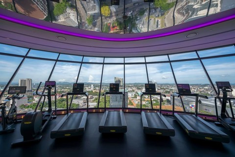 Hotel gym with panoramic views, Pattaya, Thailand