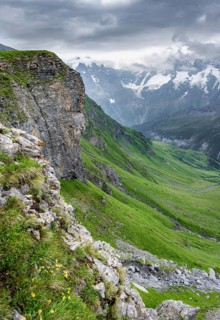 View of a green high valley and steep mountain peaks, cloud-covered mountain landscape, Rote Härd,