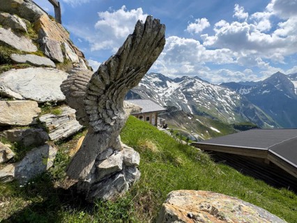 Stone-carved sculpture of eagle on Edelweissspitze next to Edelweisshütte, Fusch, Province of