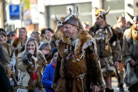 Members of a fools' guild in traditional Haes, fools' clothes, during the carnival procession in