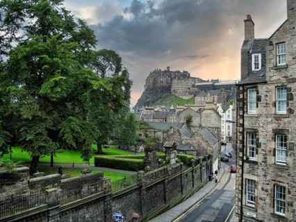 View of Edinburgh Castle, famous Greyfriars Kirkyard cemetery, twilight, old town, Edinburgh,