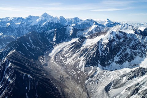 Snow and ice, epic mountains with glaciers, aerial view, Alaska Range, Denali National Park,