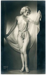 Thora Wells, dancer, Casino de Paris, cabaret, revue, half naked, elegantly dressed woman holding a