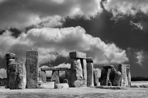 Stonehenge ca. 3000 BC, a megalithic structure from the Neolithic period, cloudy sky, black and