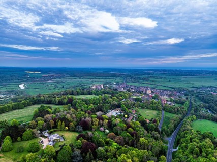 Sunset over Arundel from a drone, Arundel, West Sussex, England, United Kingdom