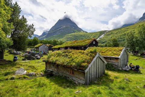 Traditional houses with grass roofs, Renndølsetra, Innerdalen high valley, Innerdalstårnet mountain