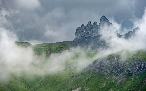 Dramatic mountain landscape with clouds, rocky jagged mountain peaks Lobhörner, near
