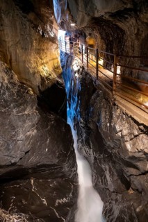 Gorge trail through narrow gorge, stream in a rock gorge of Trümmelbach, Trümmelbach Falls, long