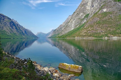 Tranquil lake in a landscape surrounded by high mountains, Eikesdalen, Eikesdalvatnet, Aursjövegen,