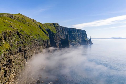 View of the steep cliffs of Liraberg, Skopun, Sandoy Island, Faroe Islands, Denmark