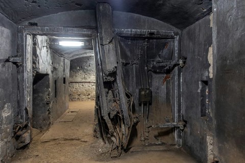 Breached steel blast door by hollow charge inside Fort Eben-Emael, Belgian WW2 fortress in Wallonia