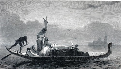 The selected picture shows a historic Venetian funeral gondola, from the 19th century on its way to