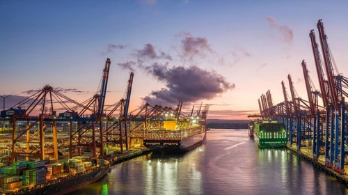 Panoramic aerial view at Waltershof harbour during the Blue Hour with Eurogate Container Terminal