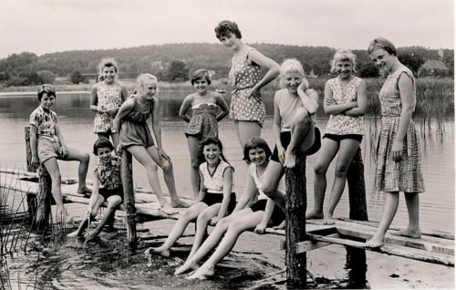 Bathing, swimwear, leisure, summer, woman, girls, children, group of girls posing happily at a pier