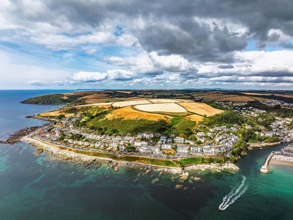 Beach and Cliffs over Looe Bay from a drone, Looe, River Looe, Cornwall, England, United Kingdom