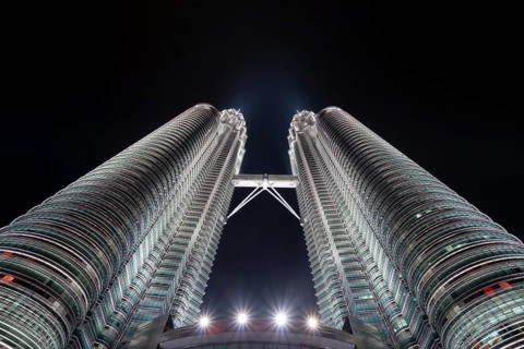 Petronas Towers, KLCC Twin Towers, interlinked 88-storey supertall twin skyscrapers illuminated at
