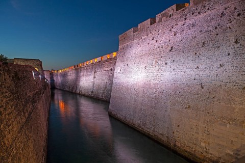 Lights illuminate the Royal moat in the Royal Walls ensemble, Ceuta, Spain, North AfricaMurallas